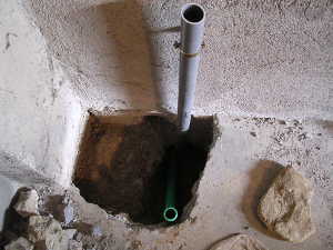 Arrivée et évacuation d'eau du lave linge collectif de nos gites.